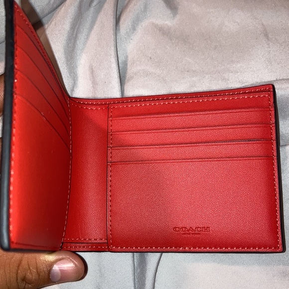 Selling my orange coach wallet - Picture 2 of 2